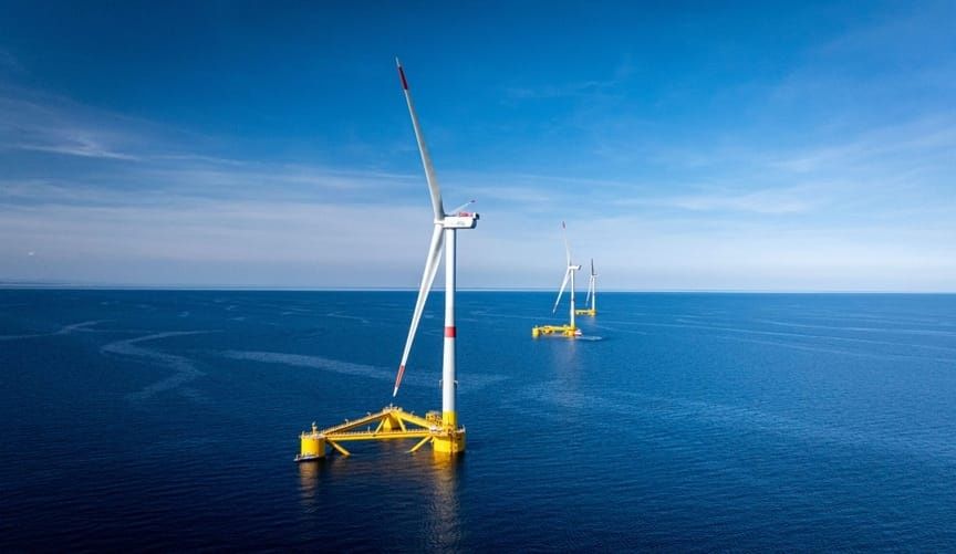 Floating offshore wind turbines standing in the open ocean